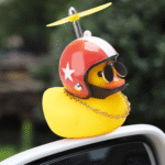 Cool rubber duck car accessory with red propeller helmet, stylish sunglasses, and gold chain — fun decoration for side mirrors and dashboards."